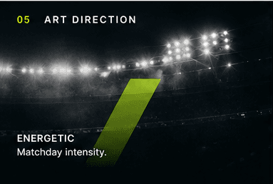 Floodlit football stadium with a player silhouette and matchday intensity